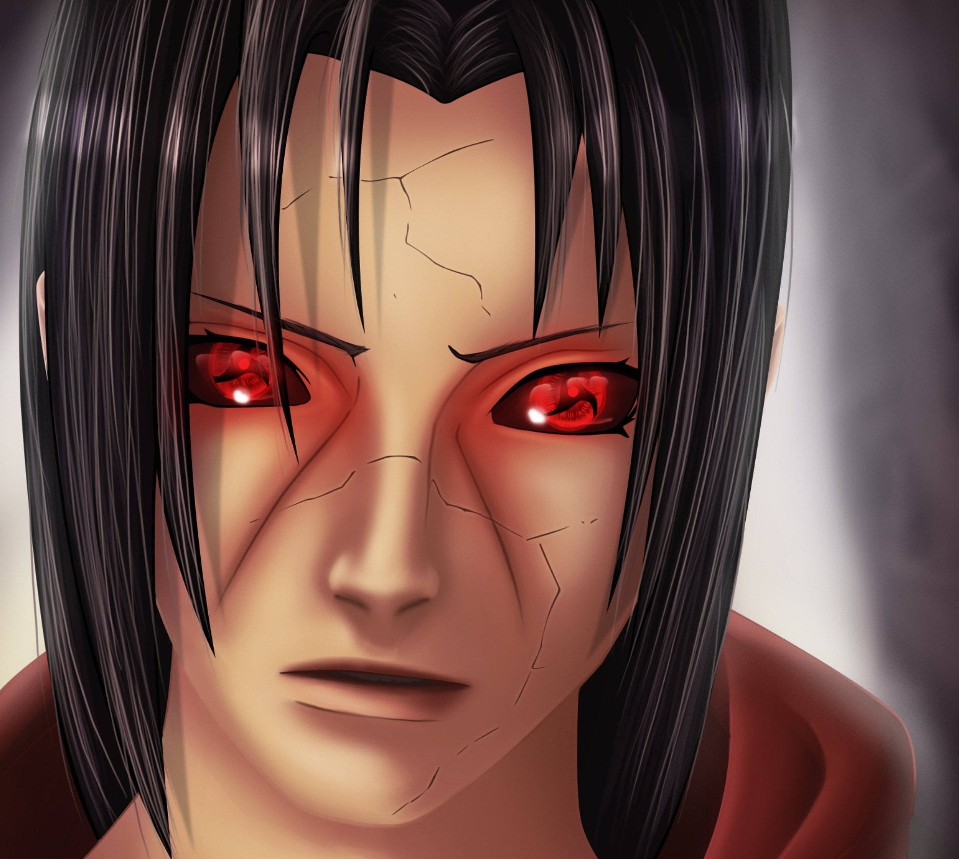 Itachi Uchiha en plan rapproché, regard intense et déterminé